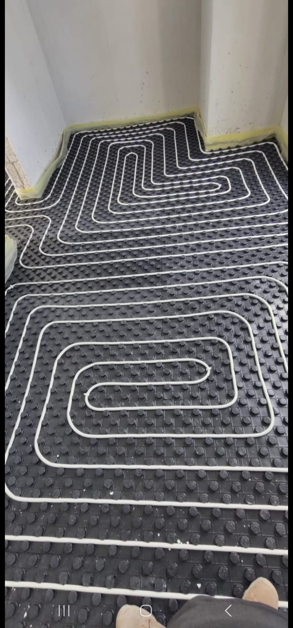 Underfloor heating pipes installation by Ceci Installations